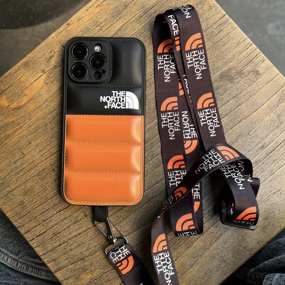 قاب گوشی آیفون North Face Orange Puffer